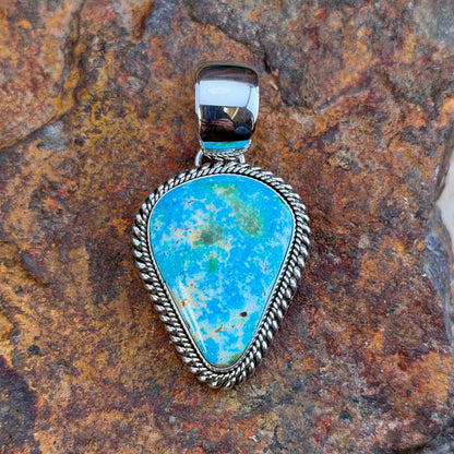 front of Sonoran Gold turquoise sterling silver pendant