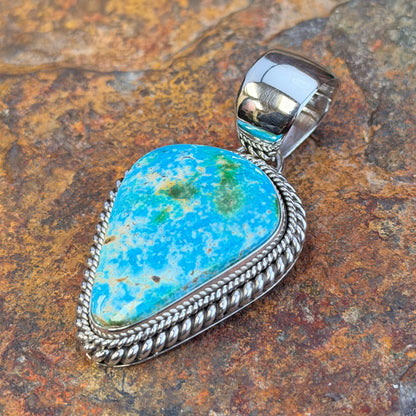 angled view of Artie Yellowhorse Sonoran Gold turquoise pendant
