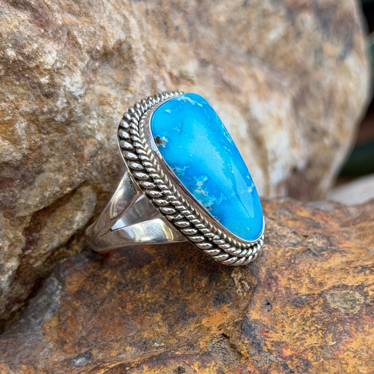 Side view of Sonoran Rose turquoise ring and split shoulders