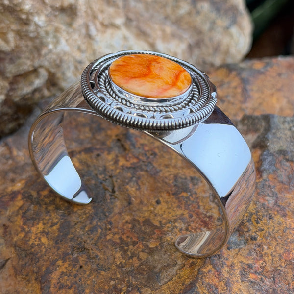 Spiny Oyster Sterling Silver Cuff Bracelet by Artie Yellowhorse, hallmark stamp