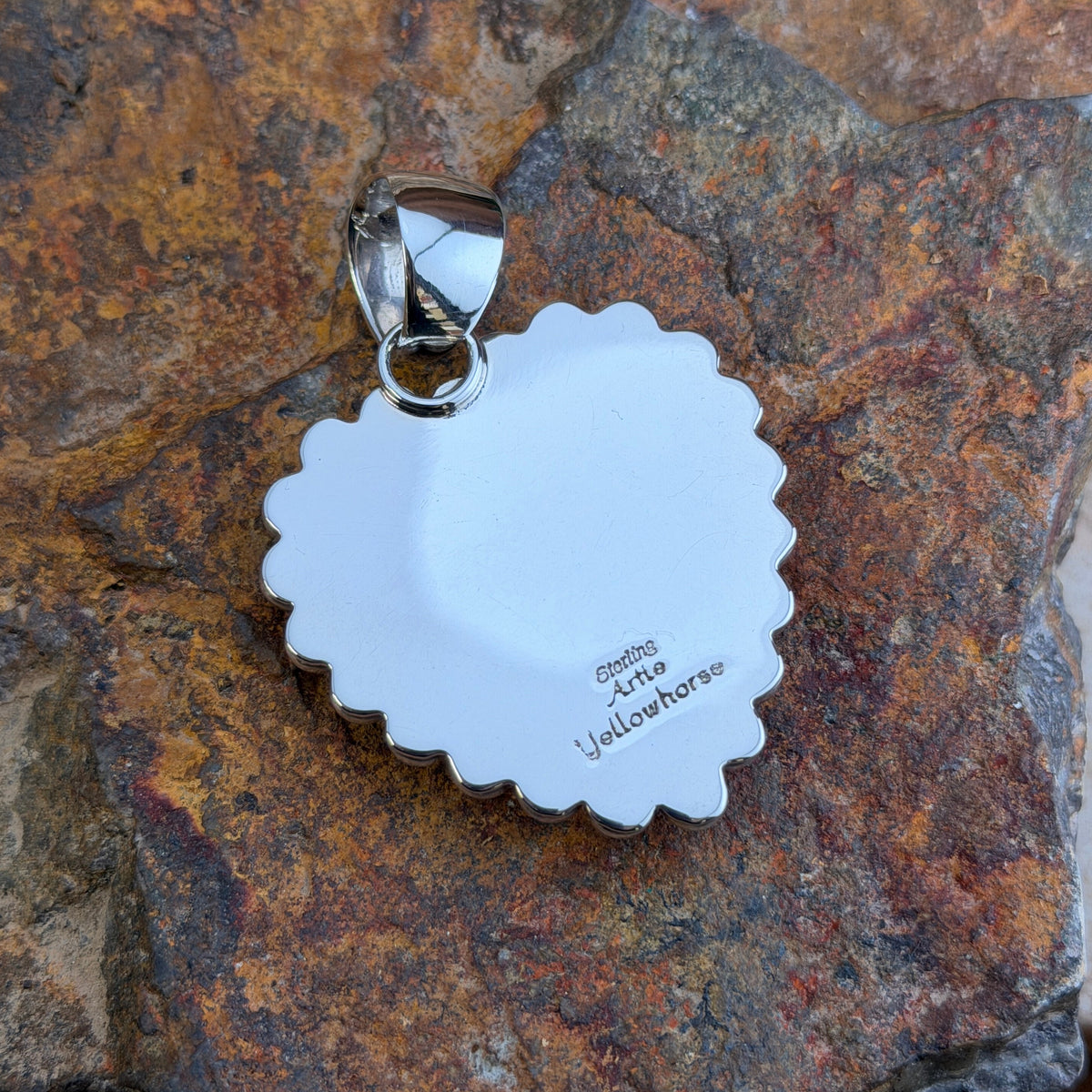 Large Spiny Oyster Heart Sterling Pendant by Artie Yellowhorse, angled view