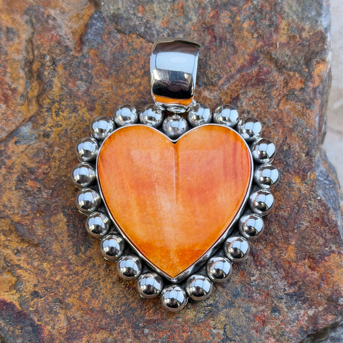 Large Spiny Oyster Heart Sterling Pendant by Artie Yellowhorse, hallmark stamp