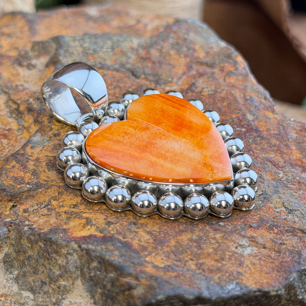 Large Spiny Oyster Heart Sterling Pendant by Artie Yellowhorse, close up
