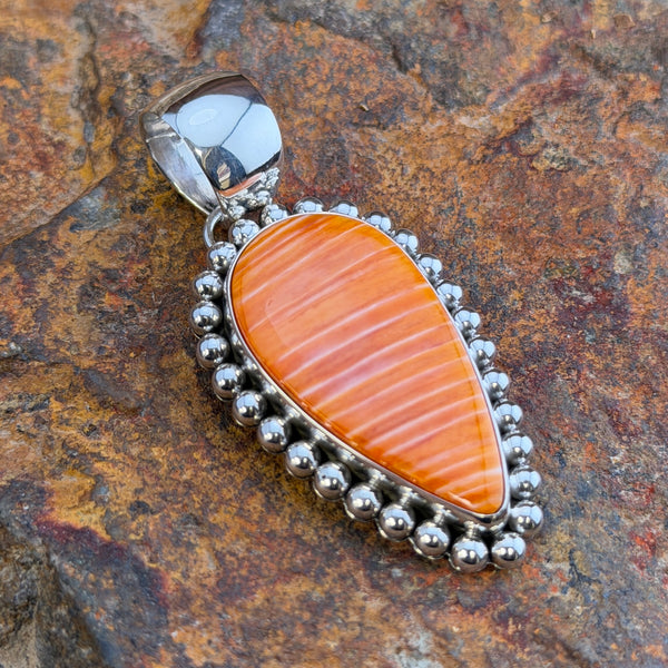 Spiny Oyster Sterling Pendant by Artie Yellowhorse, hallmark stamp