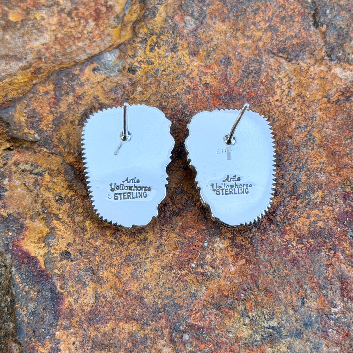 Spiny Oyster Sterling Post Earrings by Artie Yellowhorse, angled view