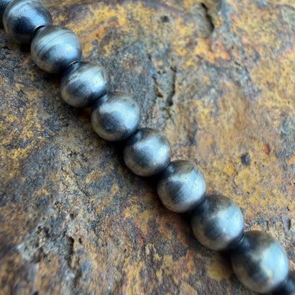 silver beaded bracelet close up shot