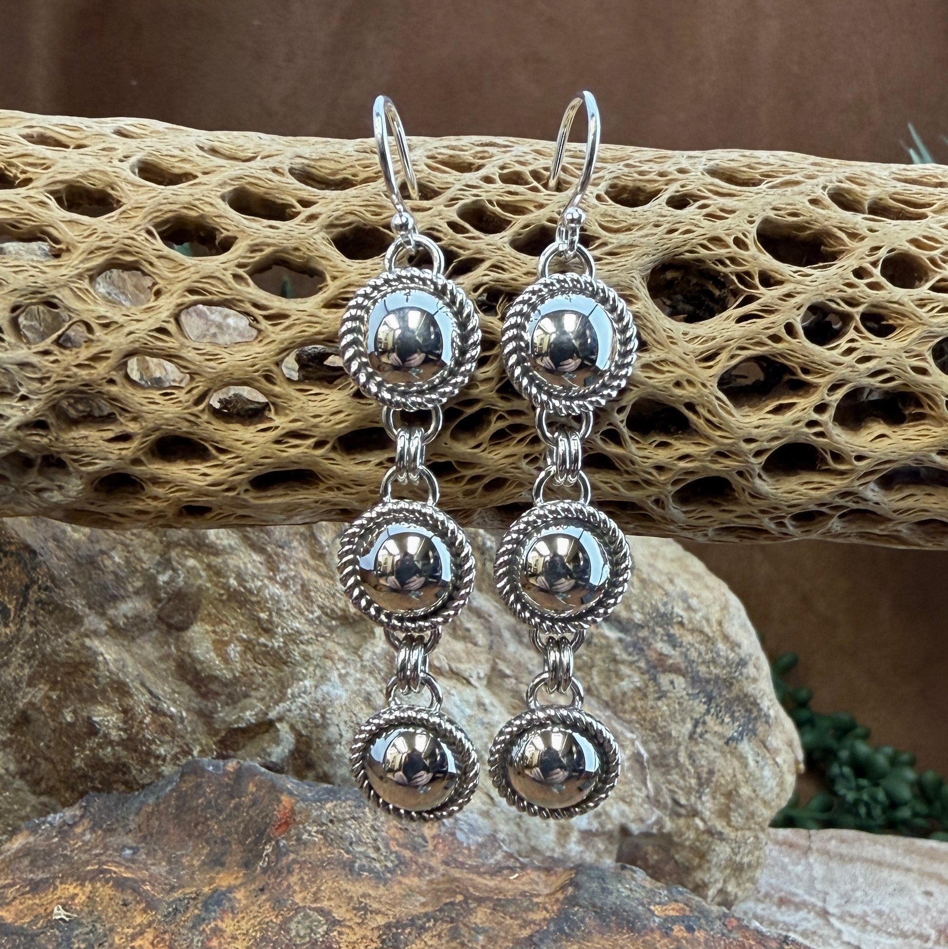 Sterling Silver Triple Drop Dangle Earrings by Artie Yellowhorse - styled on cholla cactus showing full cascading drop length