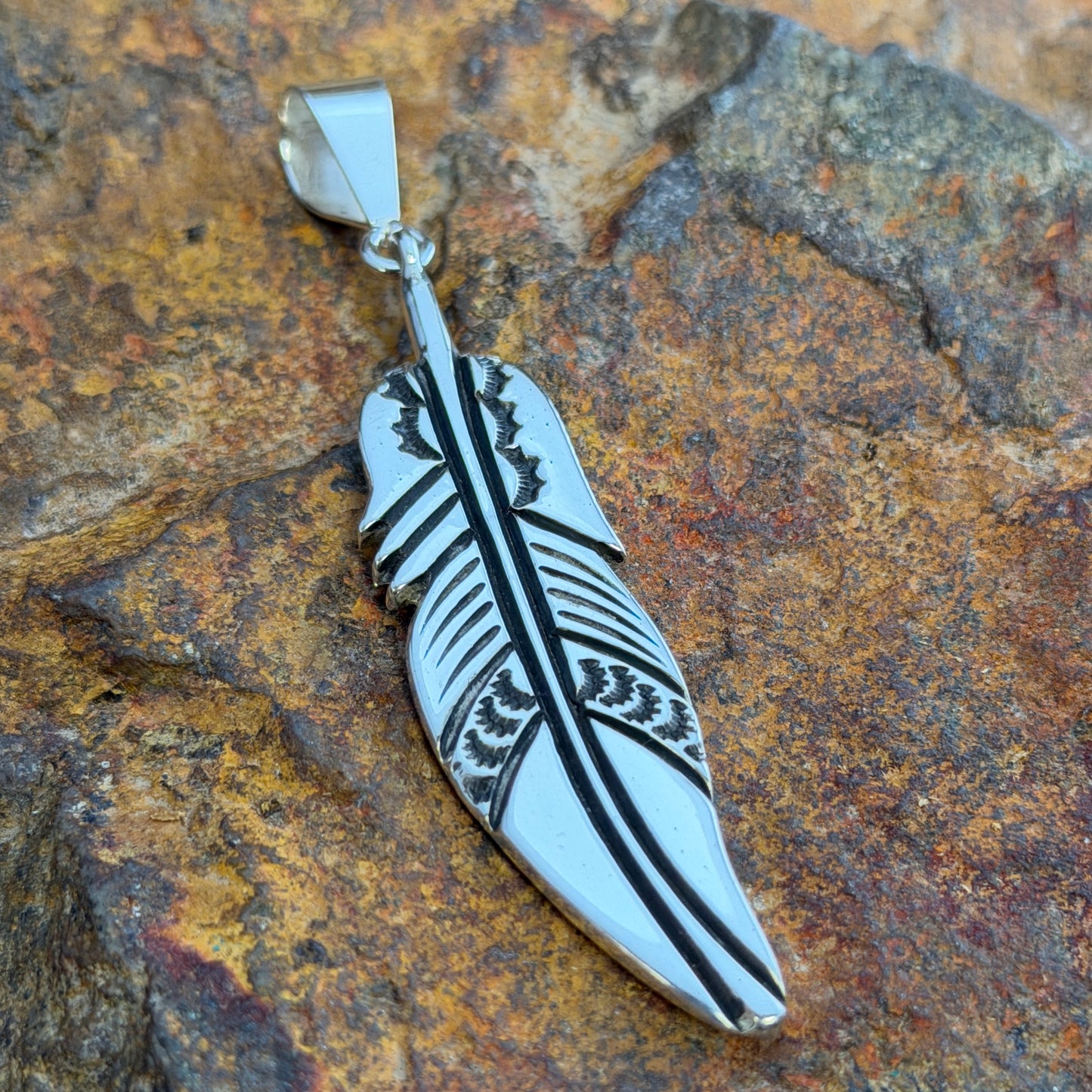 Sterling Silver Pendants by Norman Woody