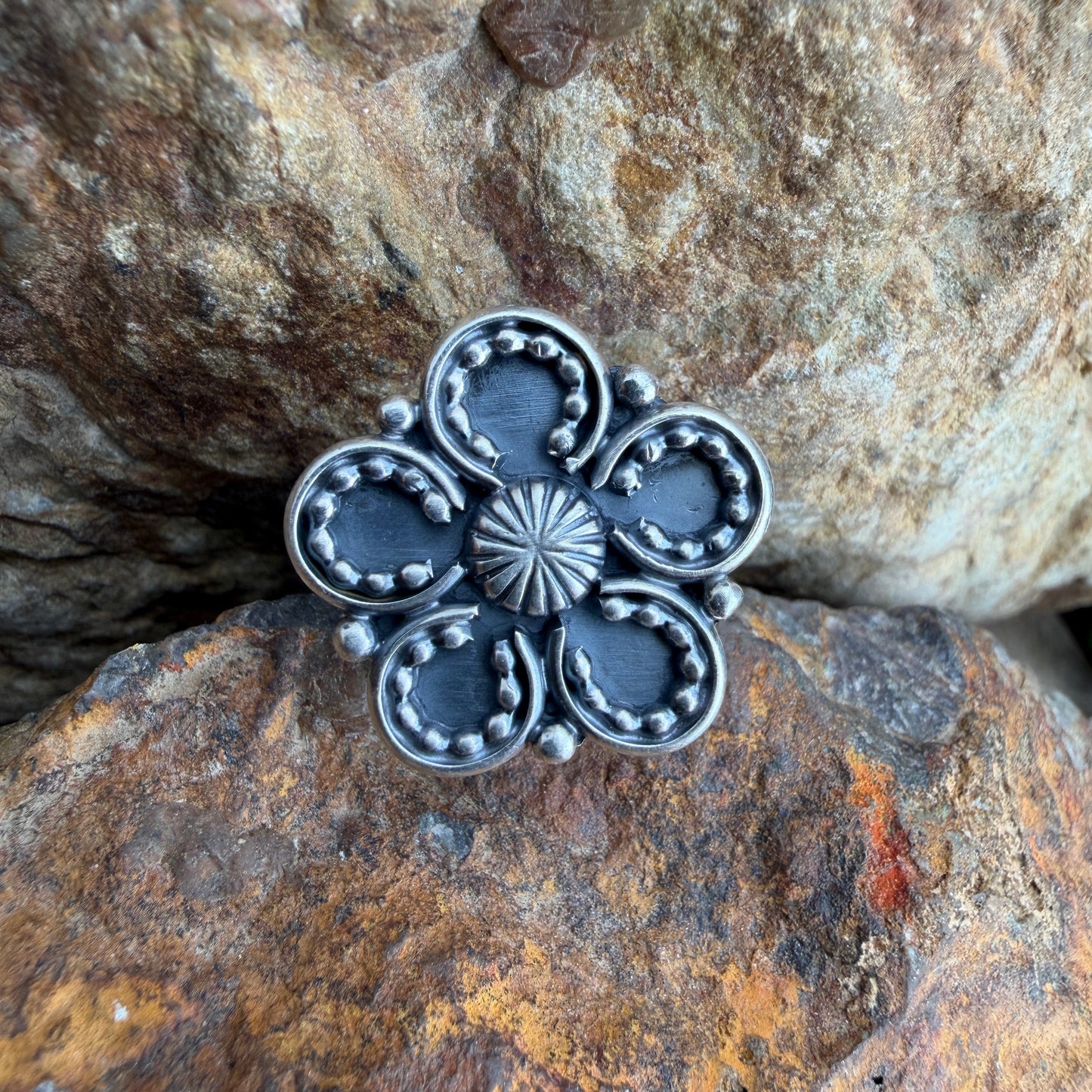 Silver floral-patterned ring
