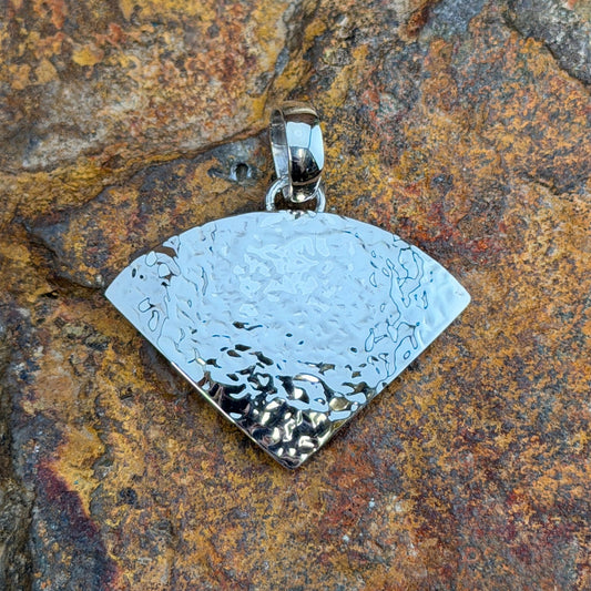 Sterling Silver Textured Fan Pendant by Artie Yellowhorse - angled view showing light-catching textured finish on fan-shaped pendant