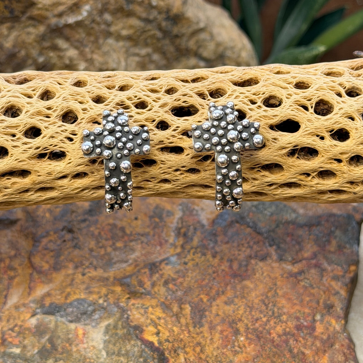 Sterling silver beaded cross post earrings by A. Douglas, front view