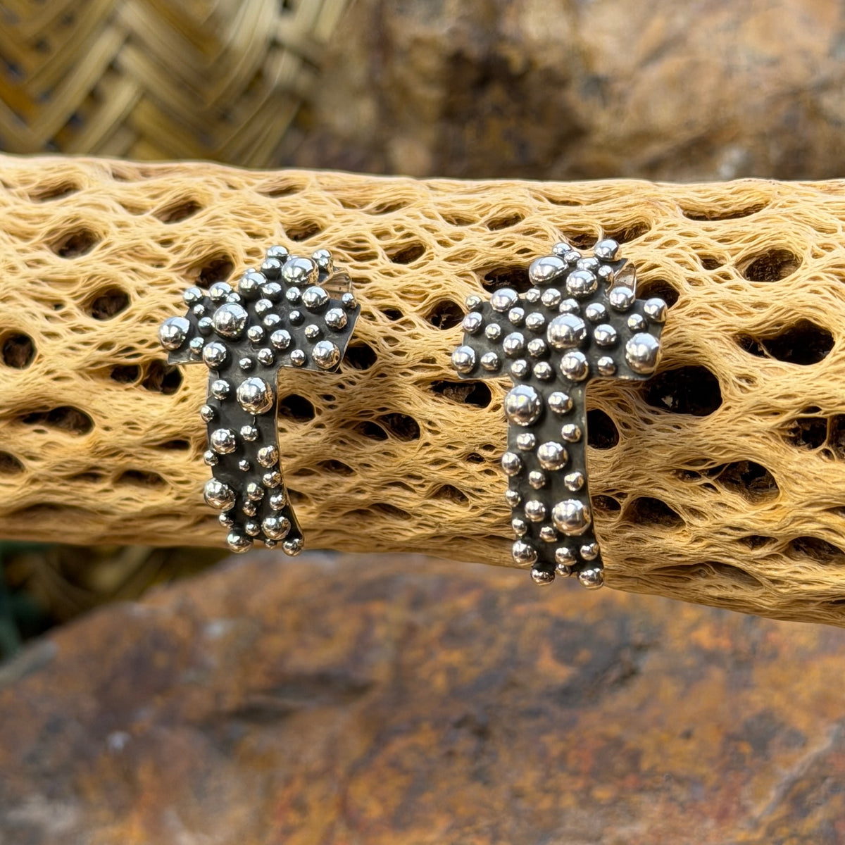 Polished silver beads on A. Douglas cross post earrings