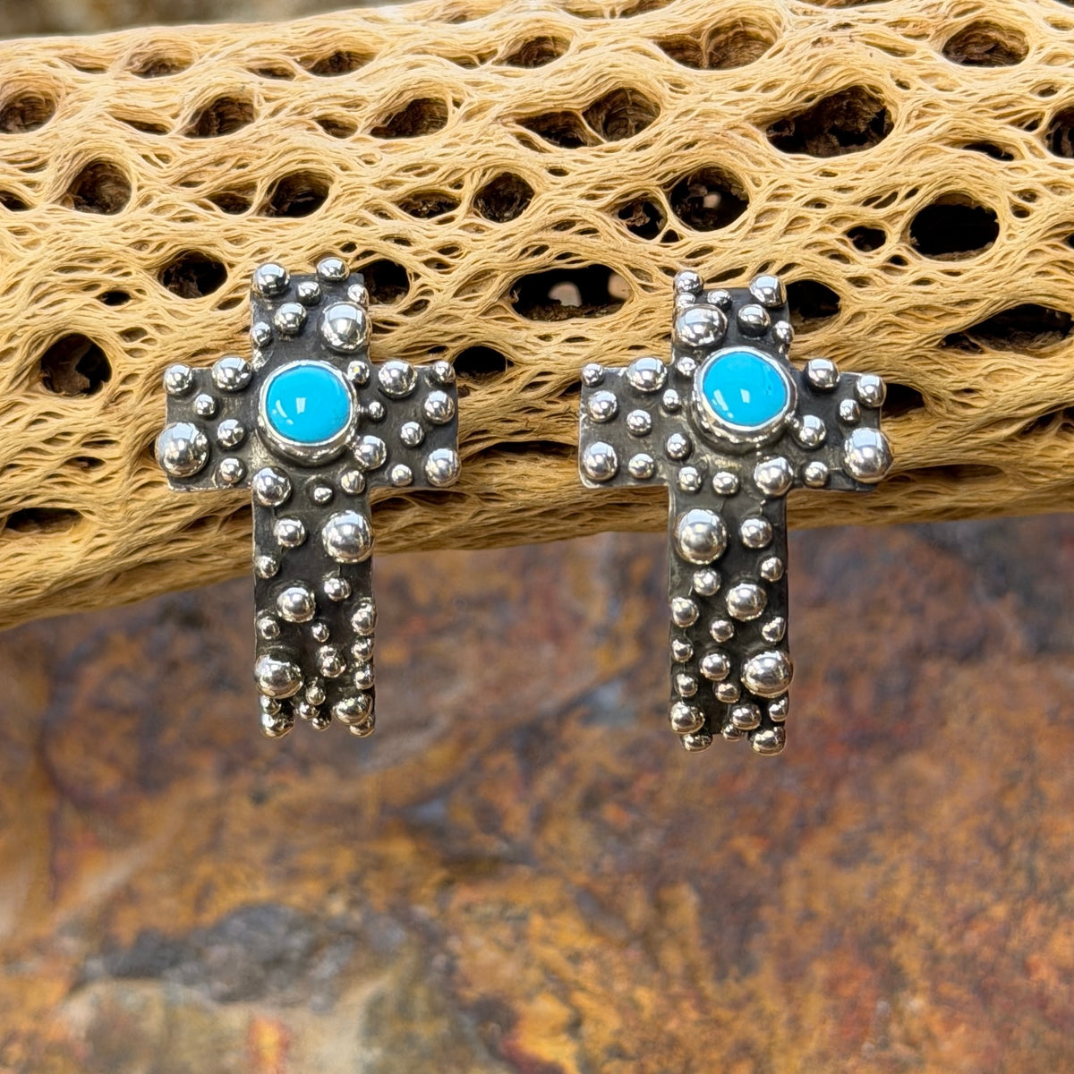 Sleeping Beauty turquoise beaded cross earrings by A. Douglas