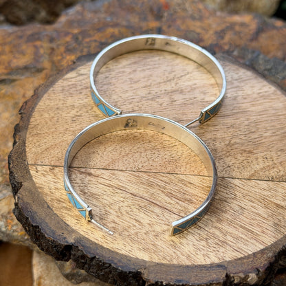 Hoop earrings inlayed in a zig zag pattern with turquoise by tina gasper