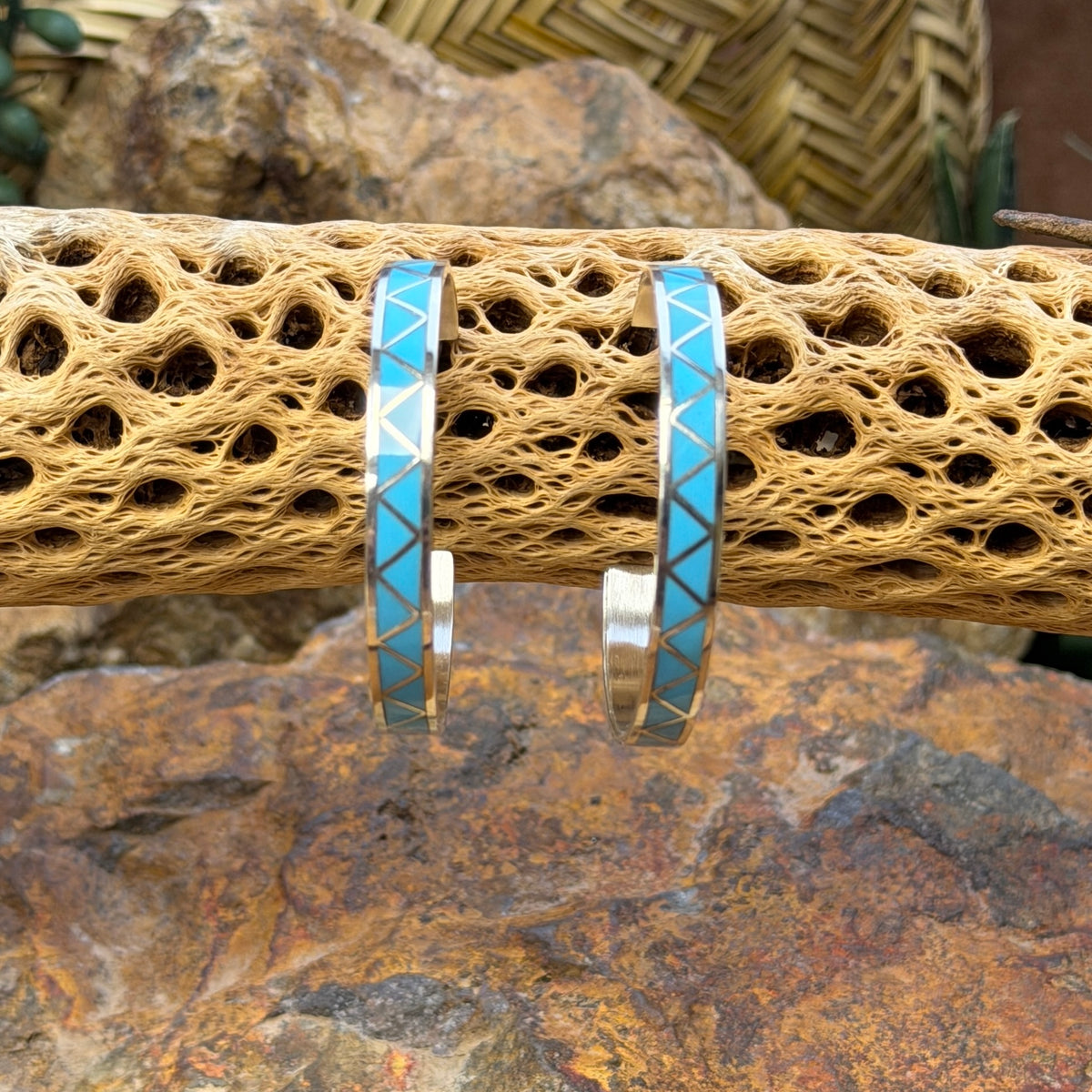 Hoop earrings inlayed in a zig zag pattern with turquoise by tina gasper
