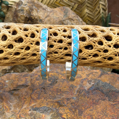 Hoop earrings inlayed in a zig zag pattern with turquoise by tina gasper
