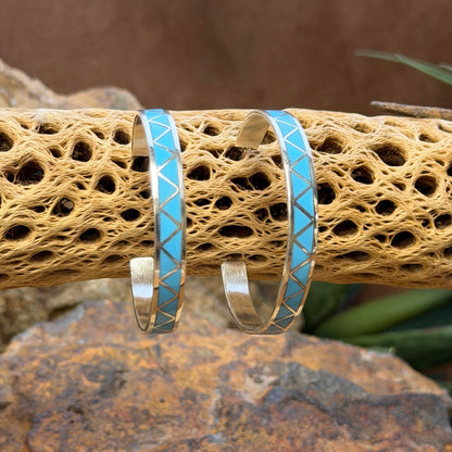 Hoop earrings inlayed in a zig zag pattern with turquoise by tina gasper