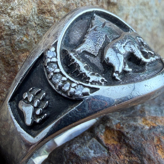 Close up of diamond detailing in the engraved bear ring