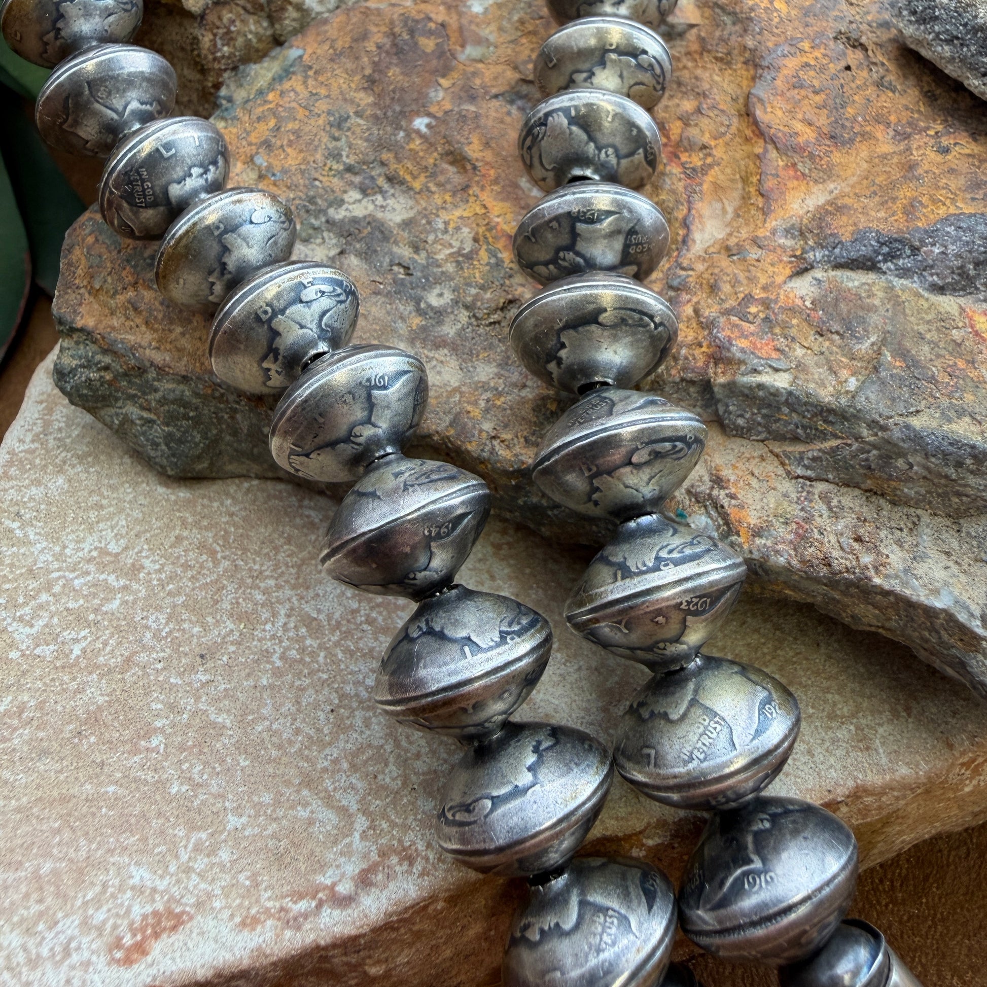 Silver beaded necklace made of  coinage
