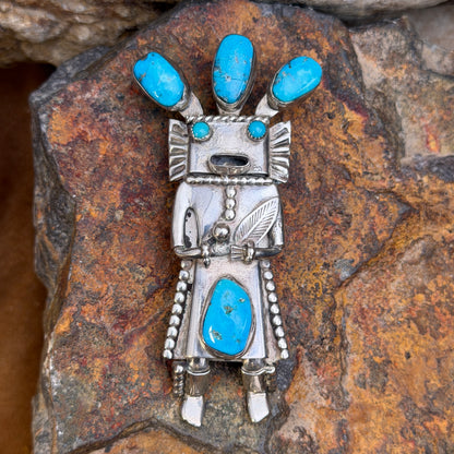 Detailed front view of blue turquoise kachina bolo slide and pendant