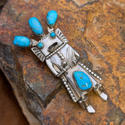 Full front view of kachina bolo slide and pendant with rich blue turquoise and crack in top center stone