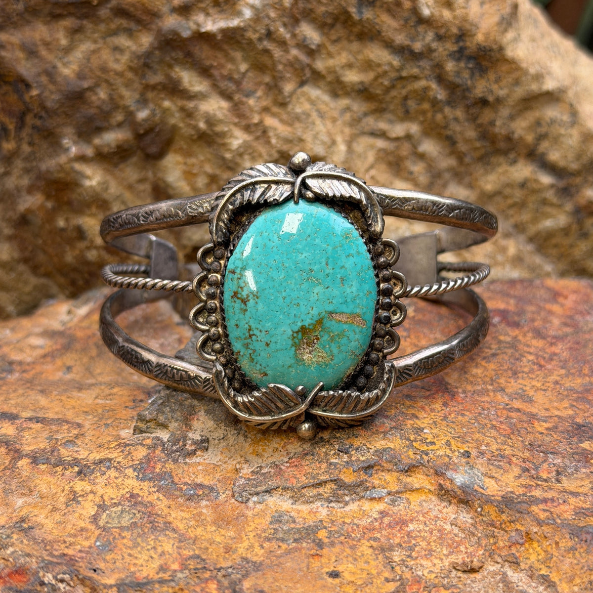 Reverse of vintage cuff showing engraved Handmade by RECO hallmark