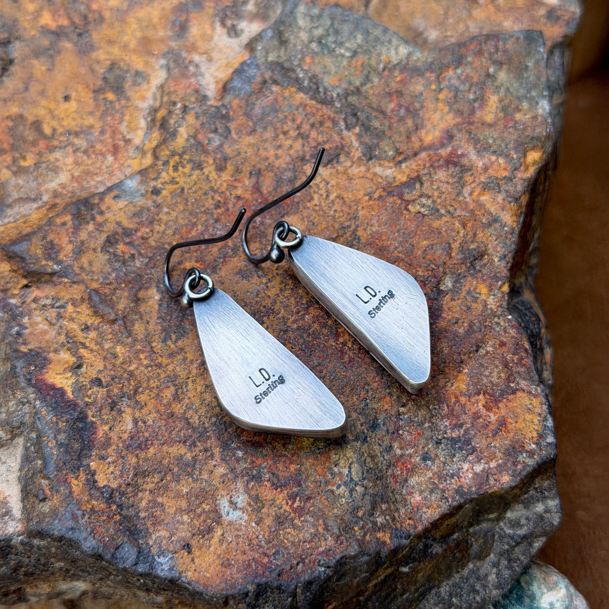 Sterling Silver White Buffalo Curved Dangle Earrings by Loretta Delgarito