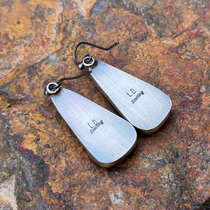 Sterling Silver White Buffalo Triangular Dangle Earrings by Loretta Delgarito