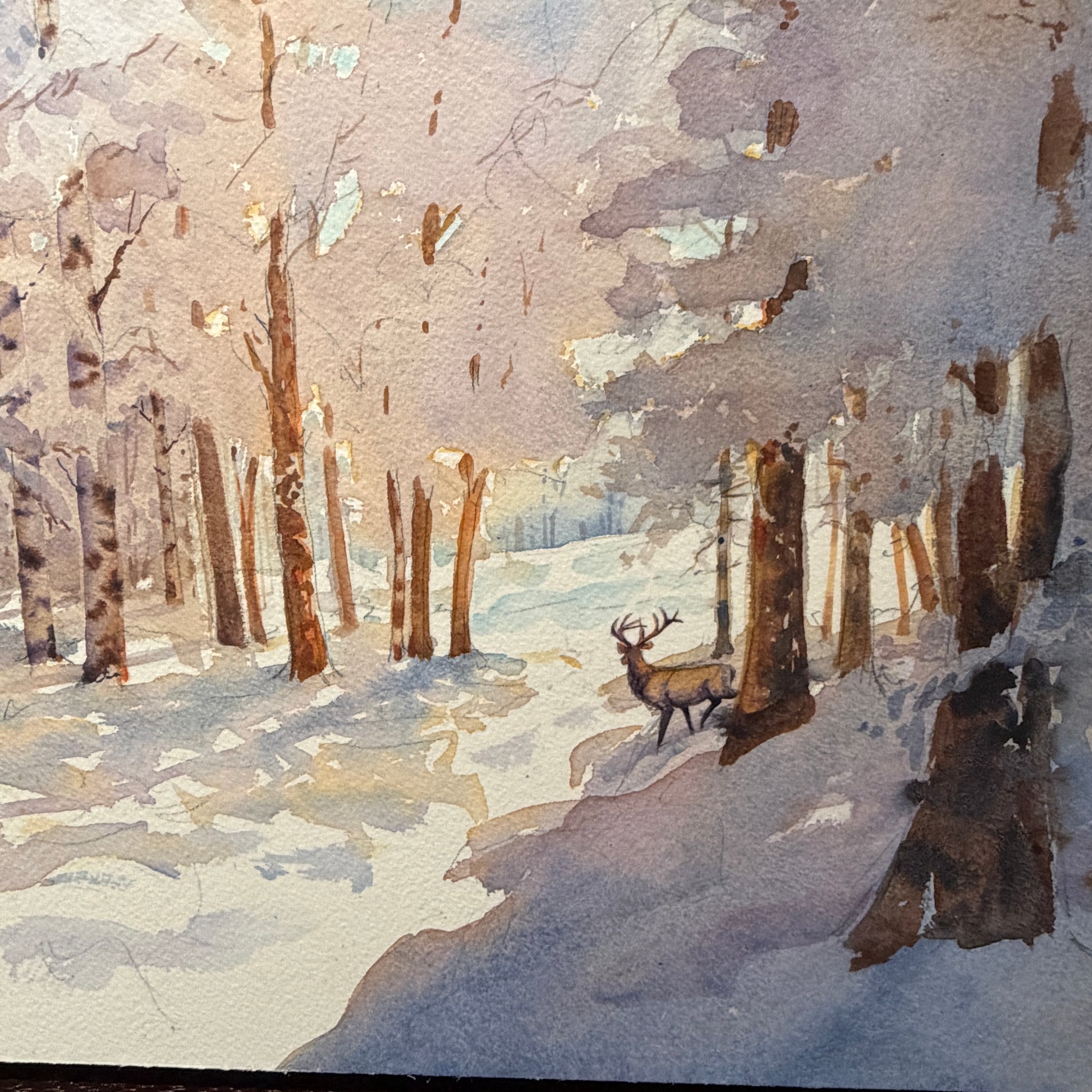 Winter forest scene with a deer, painted in watercolor.