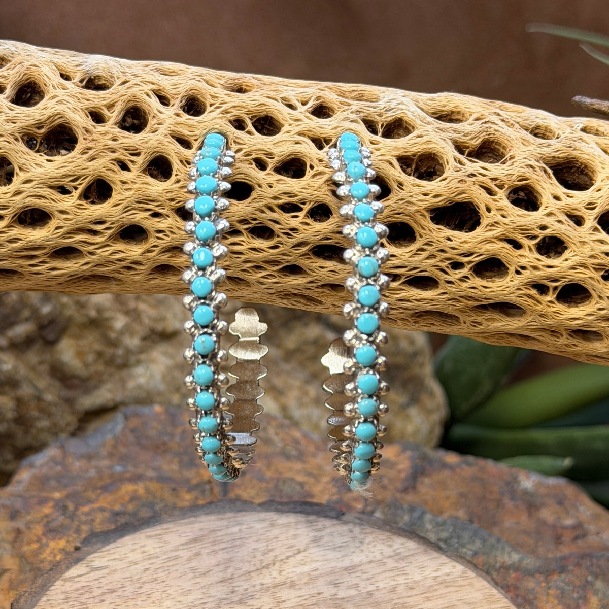 Sleeping Beauty turquoise round-stone hoop earrings by Marlon Quam, front view