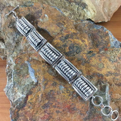Traditional Sterling Silver Link Bracelet by Tom Charlie
