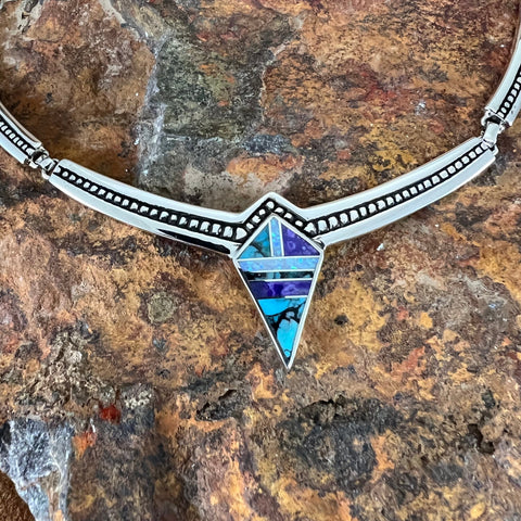 as part of the Shalako Collection features Sugilite, Tibetan Turquoise and Lap Opal.