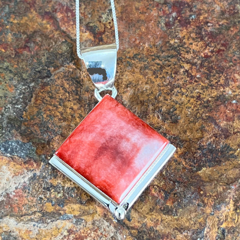 Orange Spiny Oyster Sterling Silver Pendant by Kenneth Bitsie