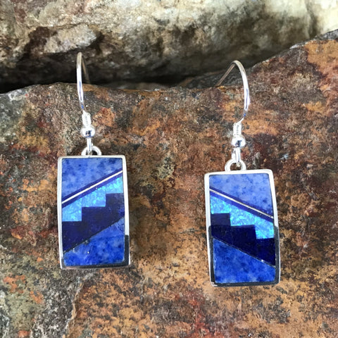 as part of the Blue Sky Collection, feature Royal Lapis, Denim Lapis and Cultured Opal in a Fancy Inlay Pattern
