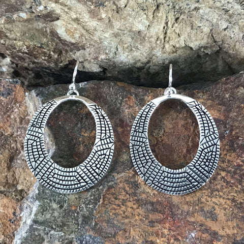 Traditional Sterling Silver Earrings by Elgin Tom