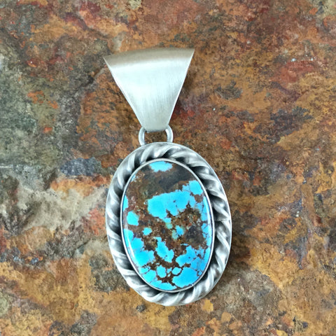 Lone Mountain Turquoise Sterling Silver Pendant by Jimmy Secatero